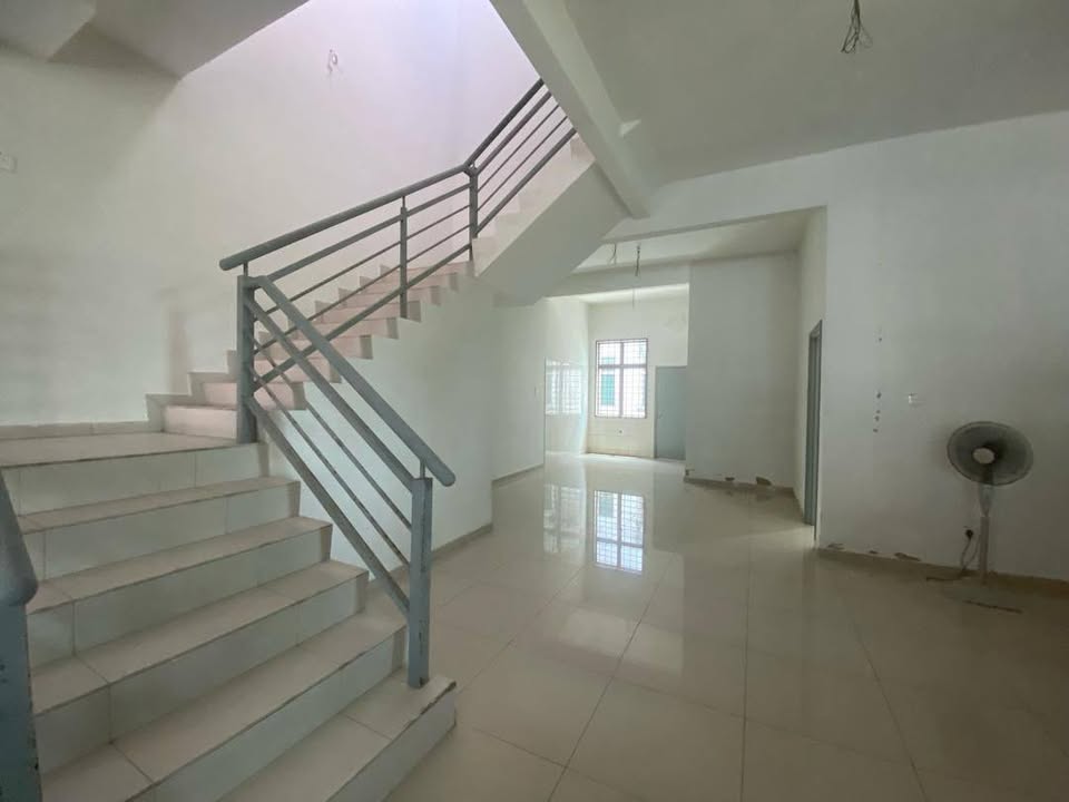 Staircase and open downstairs hall