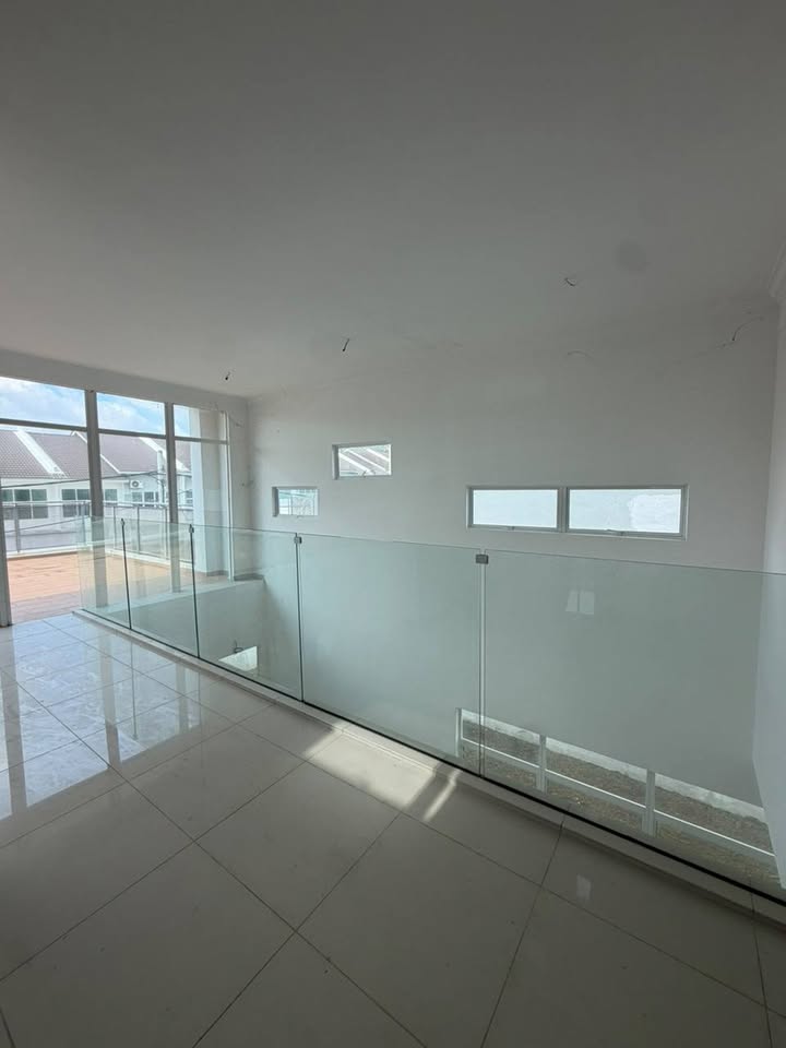 Upstairs landing with glass railing
