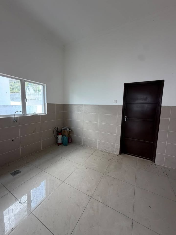 Kitchen space with tiled walls