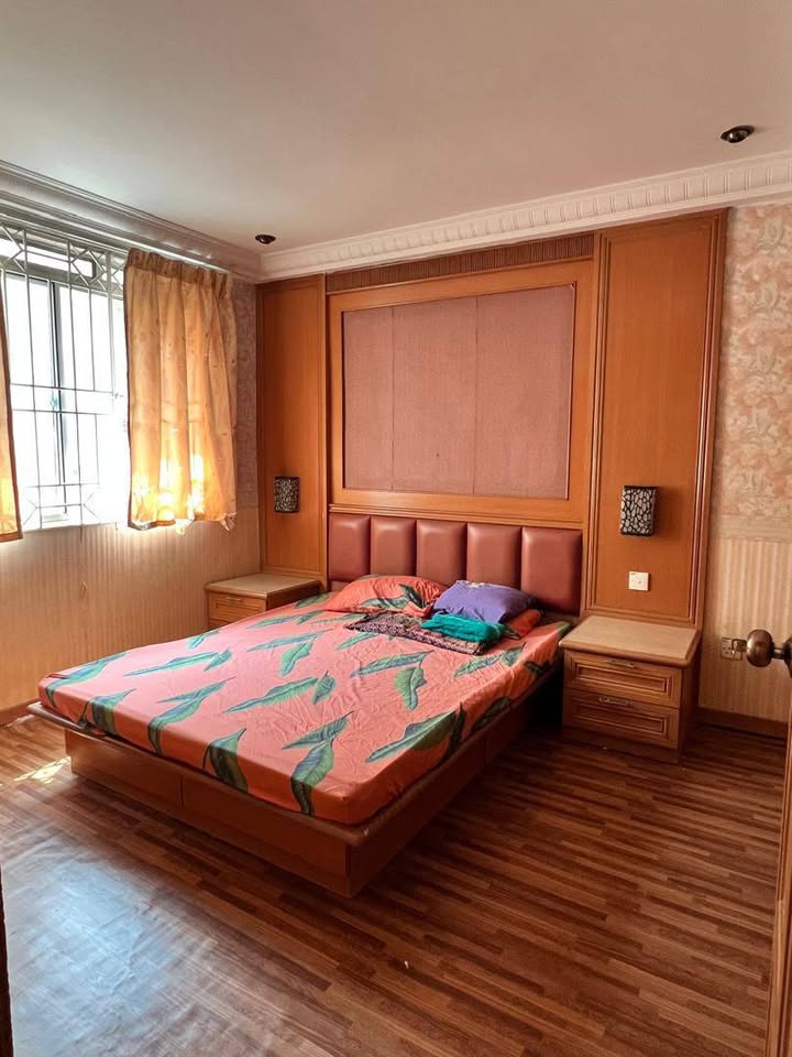 Primary bedroom with timber bed frame