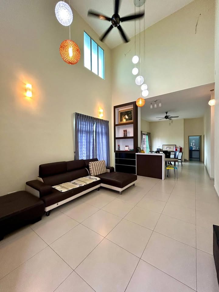 Double-height furnished living room